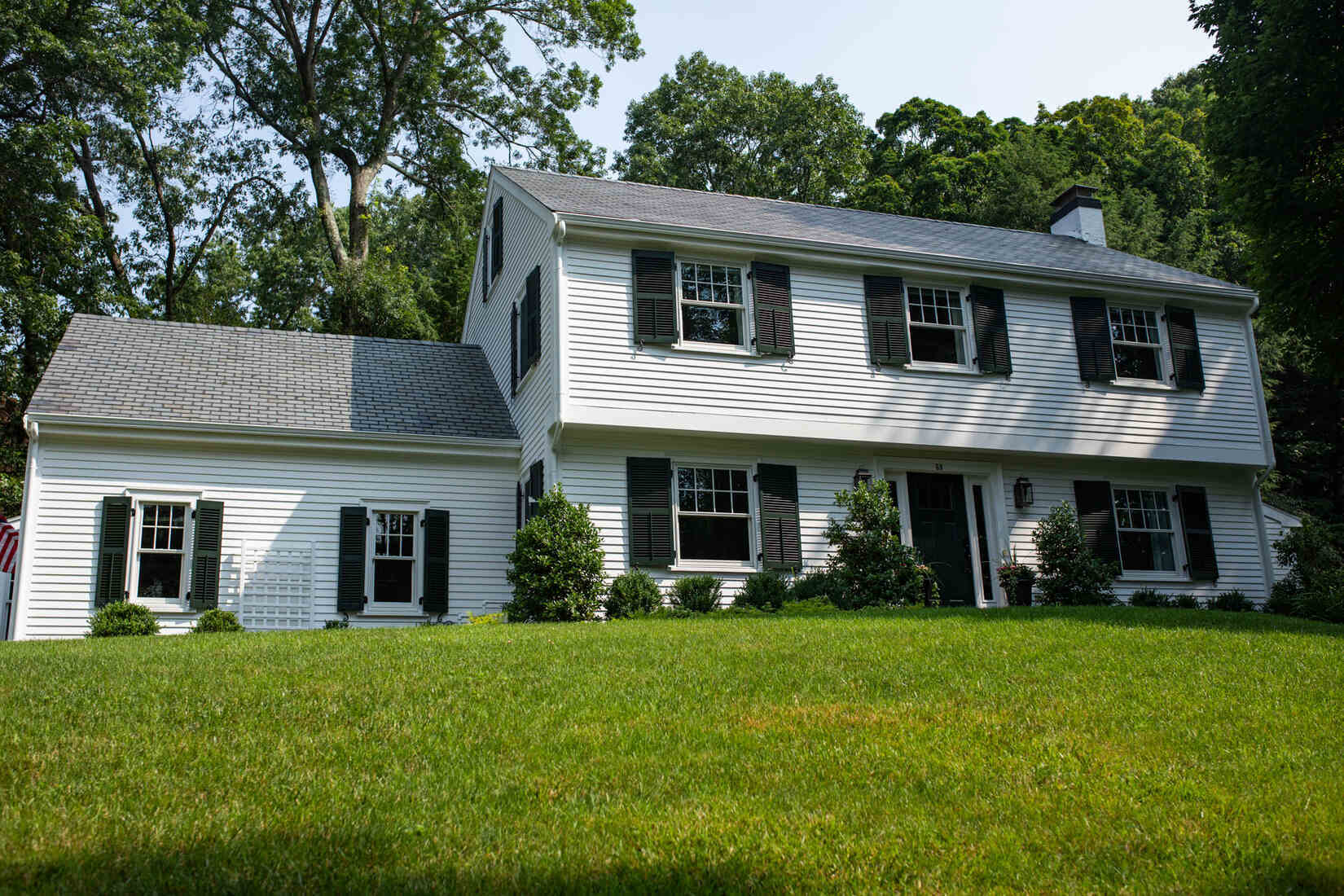New siding and fresh paint on house in Wellesley, MA, with updated siding