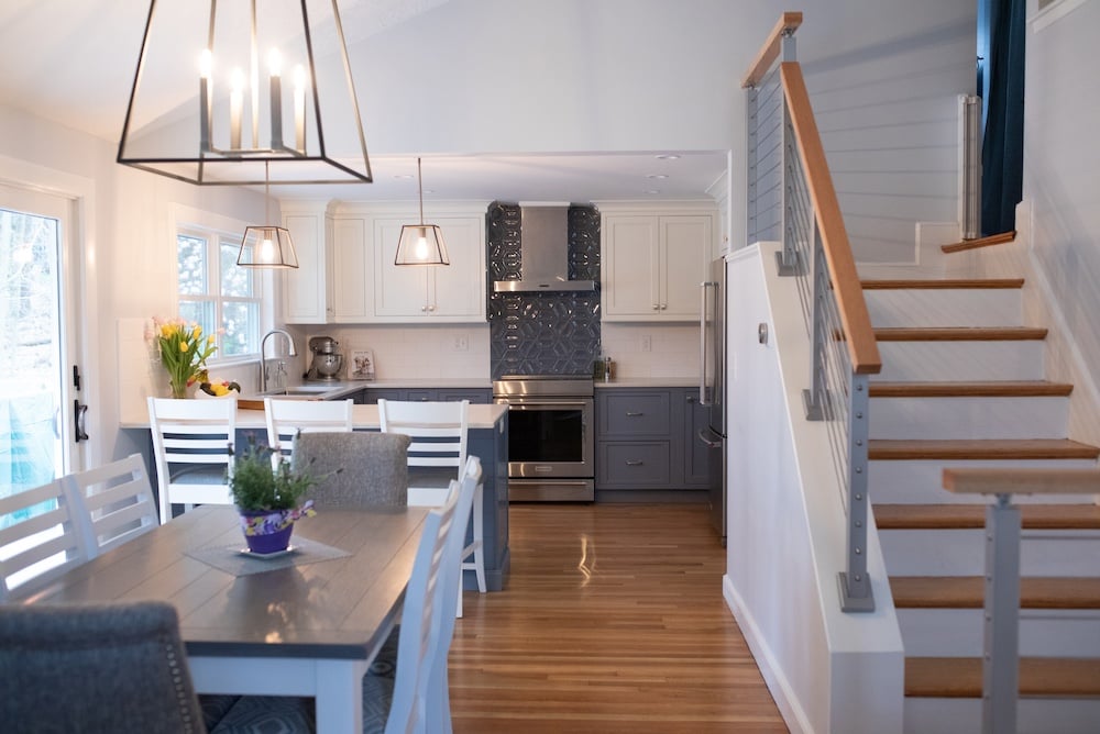 Kitchen and dining room remodel with wood floors and blue cabinets Kitchen and dining room remodel with wood floors and blue cabinets