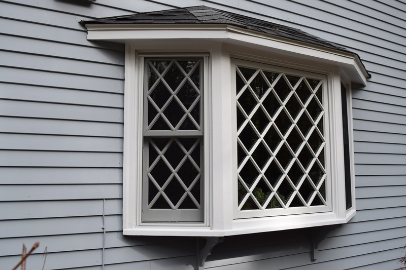 Close-up view of a bay window with lattice design