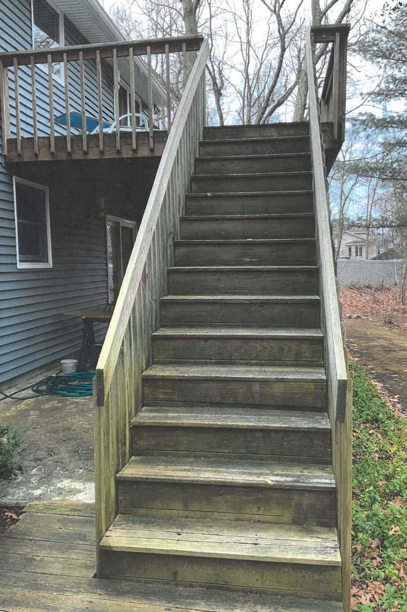 Before Wood Deck over concrete patio in Burlington MA