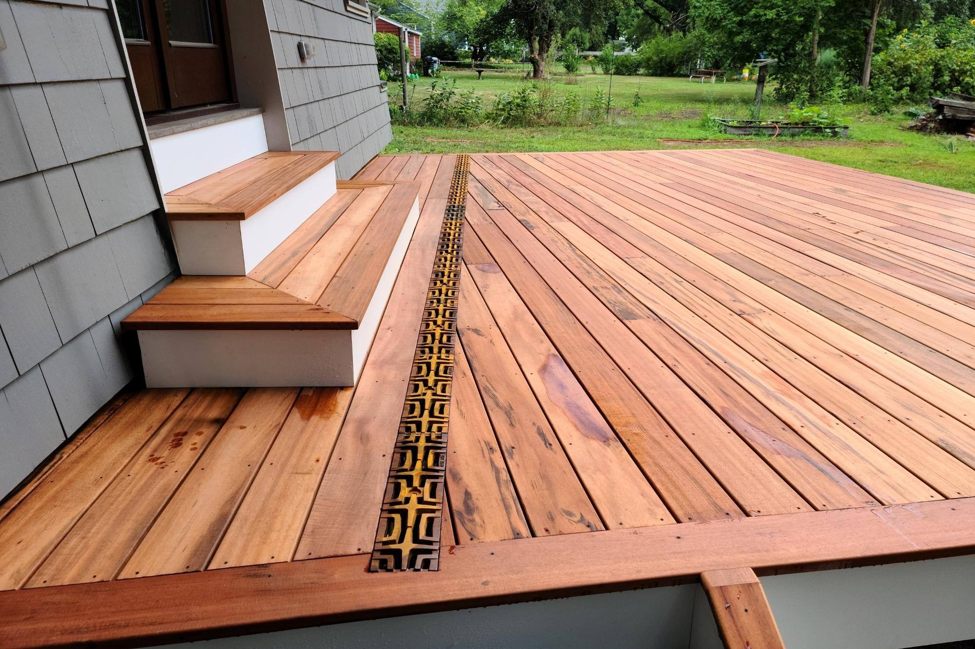 Exotic Tigerwood Deck with Water Drainage System in Concord MA